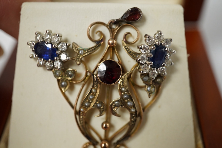 A pair of sapphire and diamond cluster earrings, length 2.2cm each, post fittings, and a gold, garnet and seed pearl pendant, length 4.7cm, stamped 9CT. Condition - good